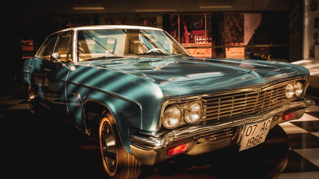 Gallerie Classic vintage car displayed indoors showcasing elegant design and chrome detail.